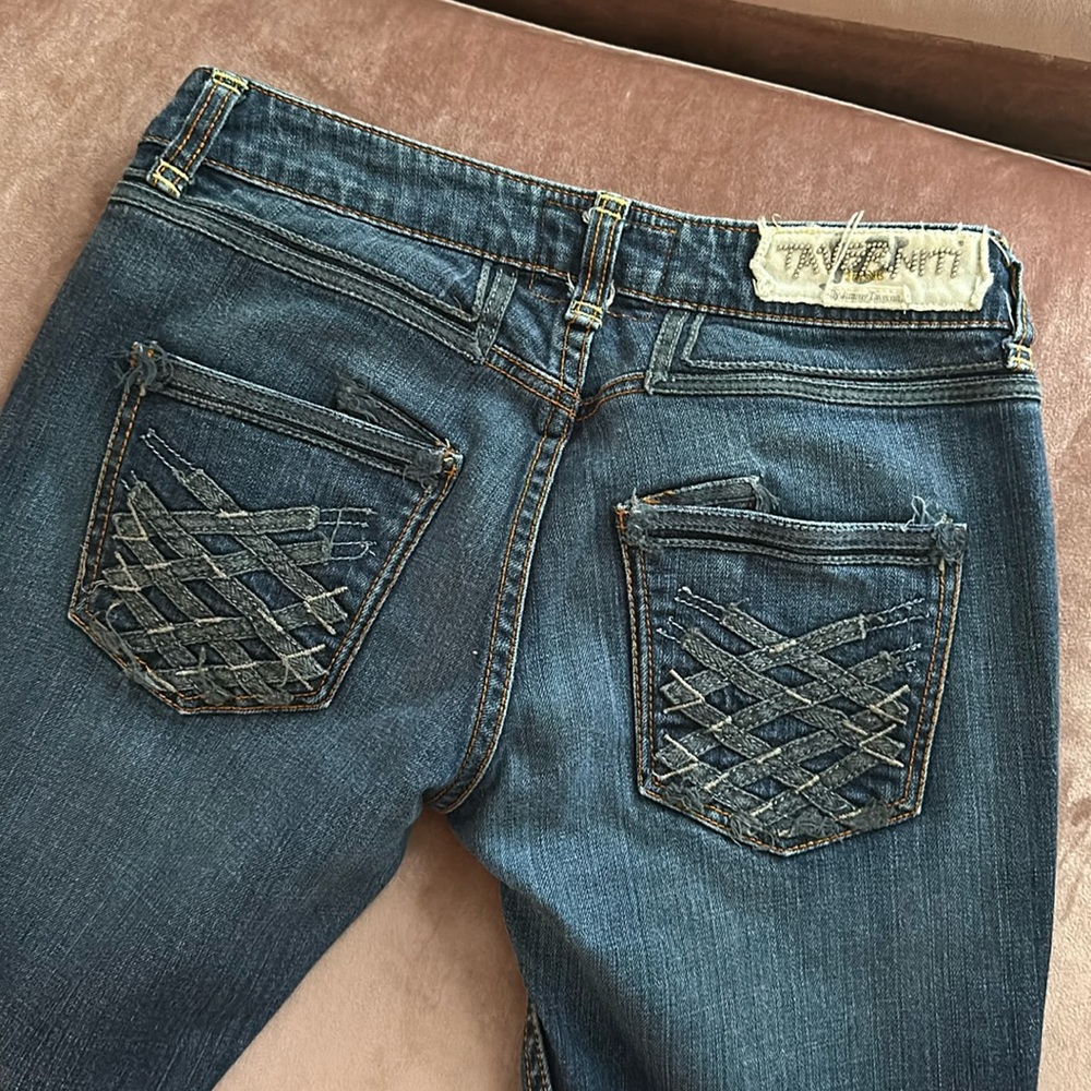 Taverniti low rise jeans